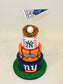 Three-tiered sports-themed birthday cake with baseball, basketball, and football designs on a white background.